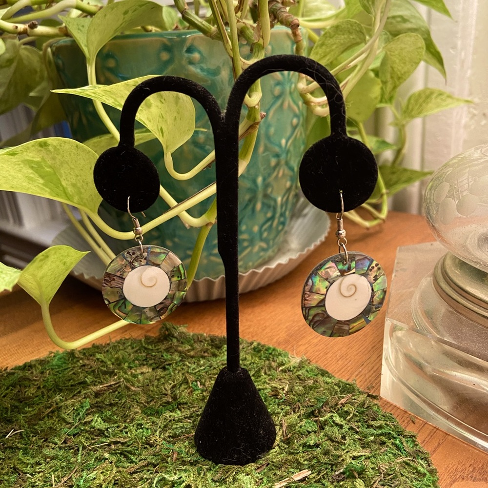 Abalone and operculum shell earrings.